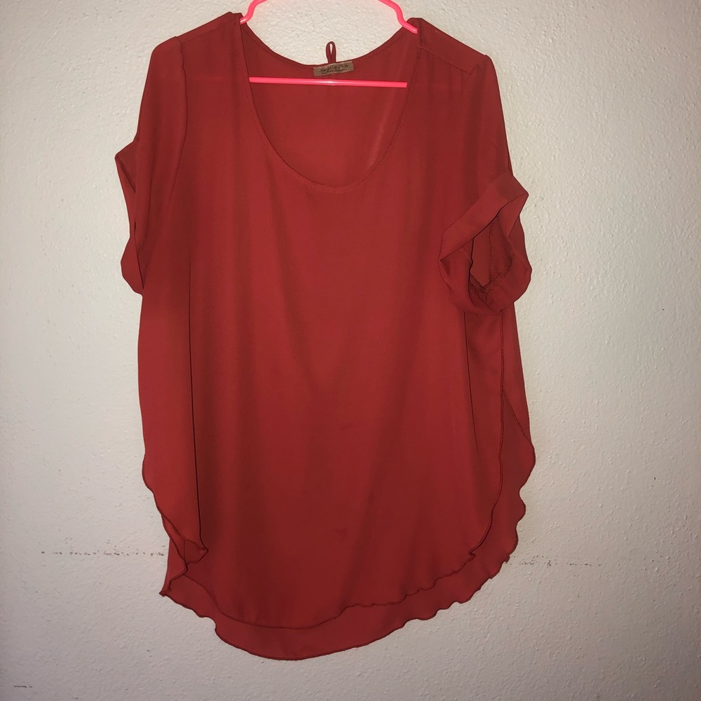 Rust colored blouse. Open sides. Size large.